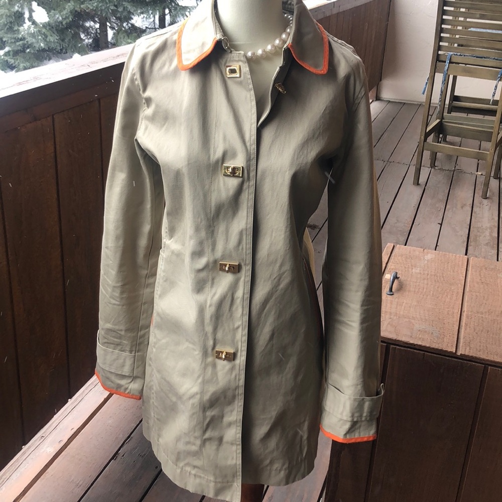 C. Wonder khaki with orange trim trench coat